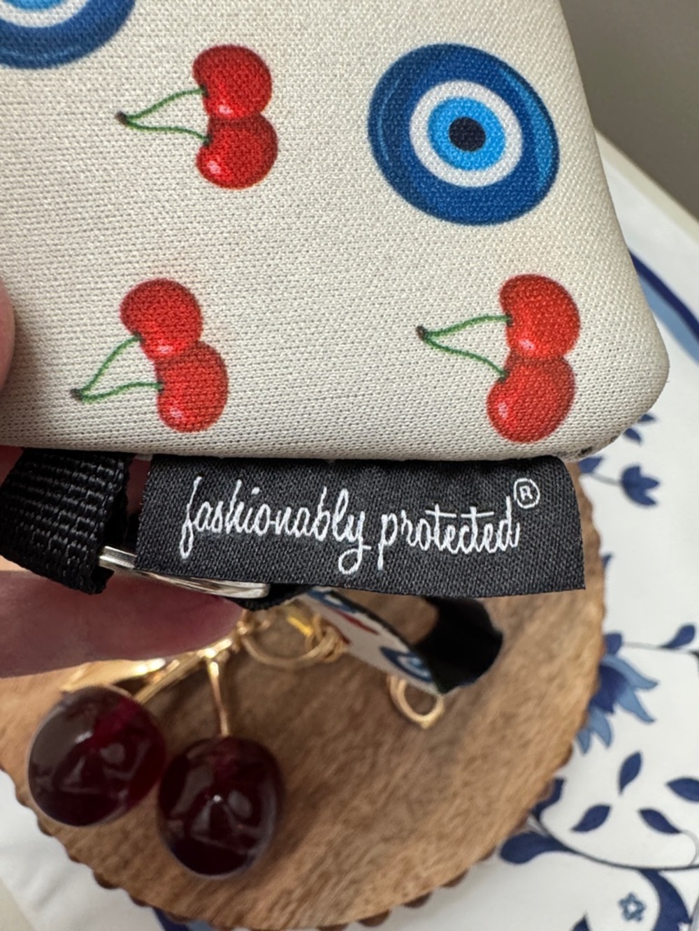 Fashionably Protected Cherry & Evil Eye Wristlet Pouch – Cream - Picture 7 of 9